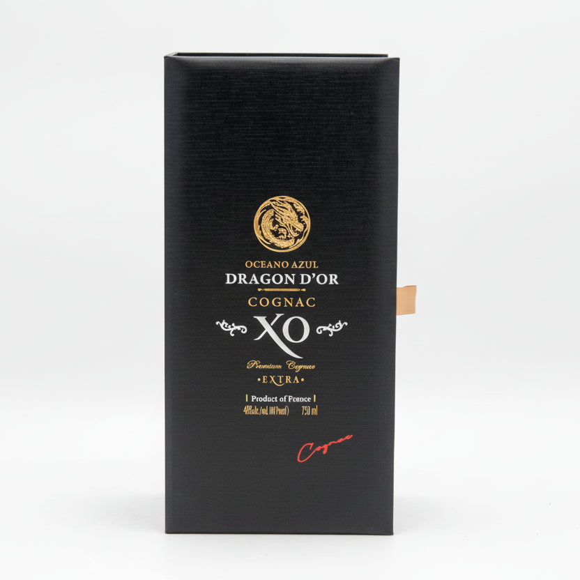 Black box with gold and white text and branding for Dragon d'Or Cognac on a white background