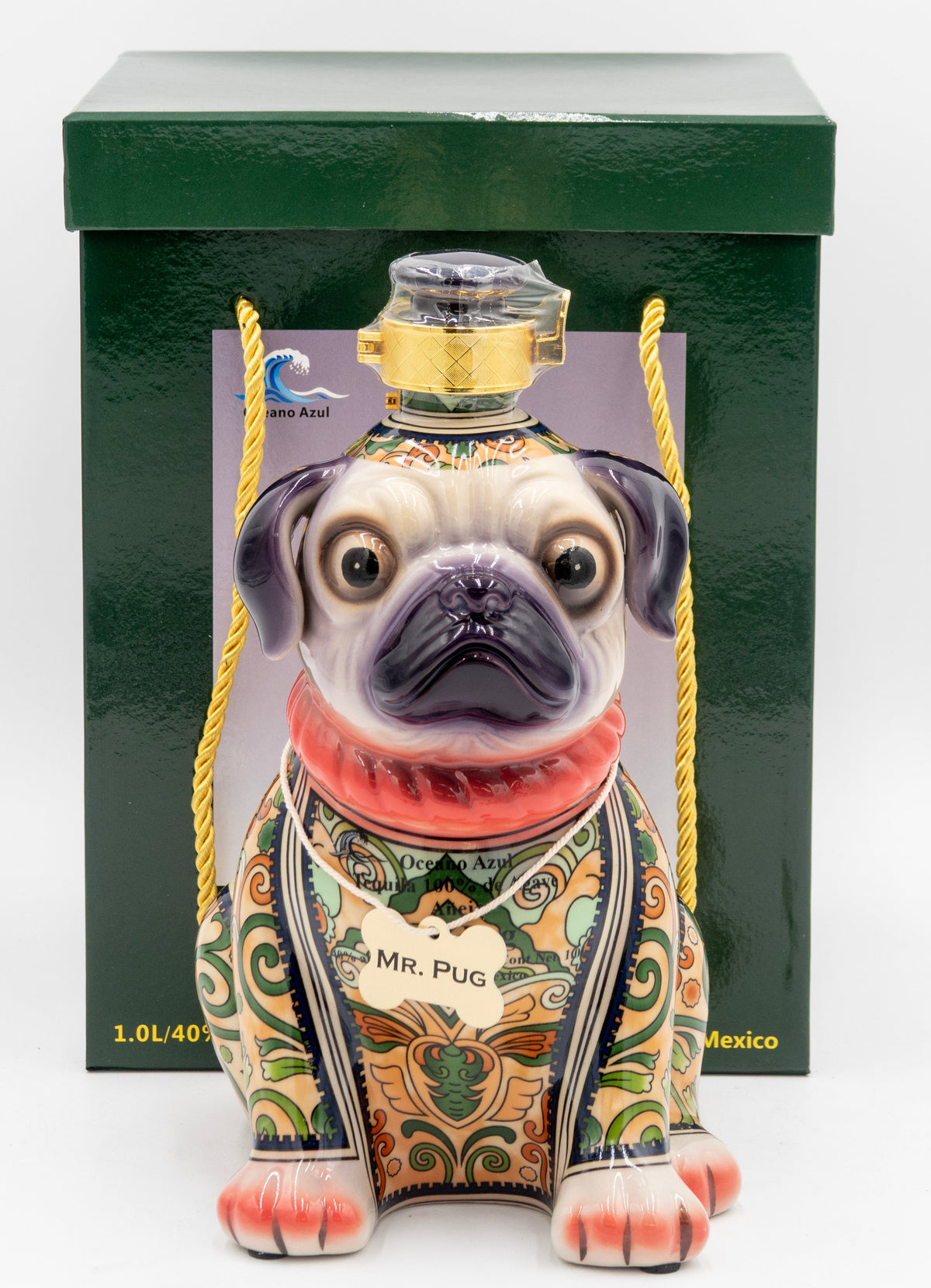 Decorative bottle shaped like a pug with a colorful design and 'Mr. Pug' label, set against a green box background.