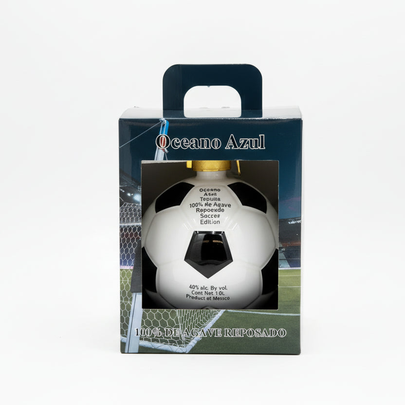 Oceano Azul tequila bottle shaped like a soccer ball in packaging with football field background