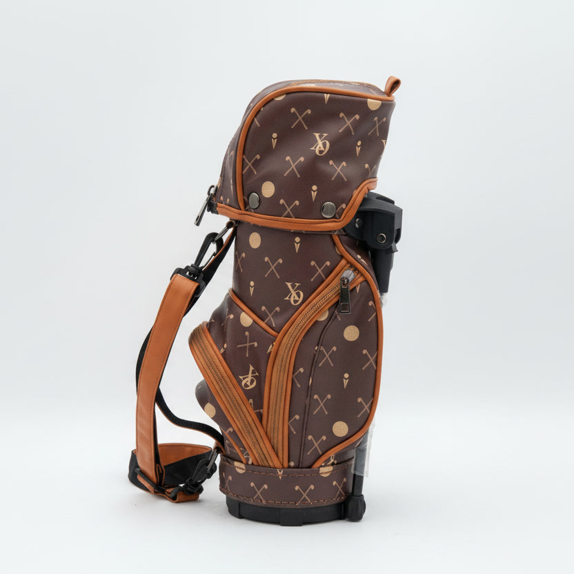 Brown golf bag with patterned design on a white background