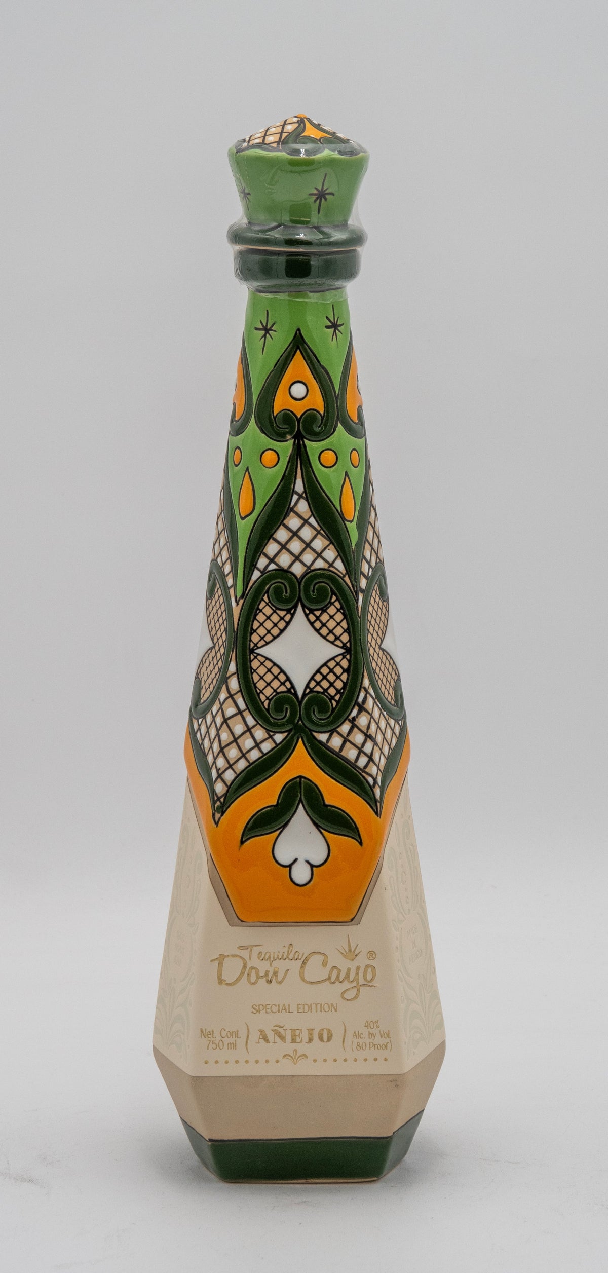 Decorative bottle with geometric patterns on a gray background