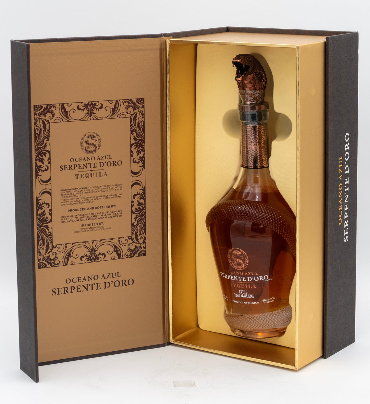 Bottle of Oceano Azul Serpente d'Oro Tequila in a decorative box on a white background