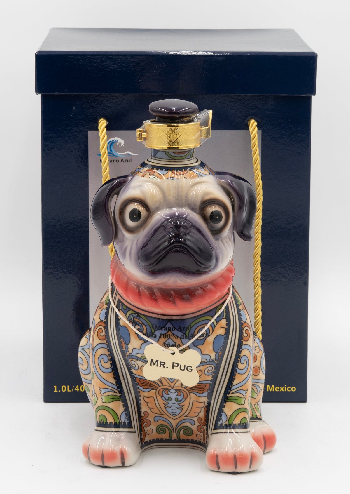 Decorative bottle shaped like a pug with intricate designs on a white background