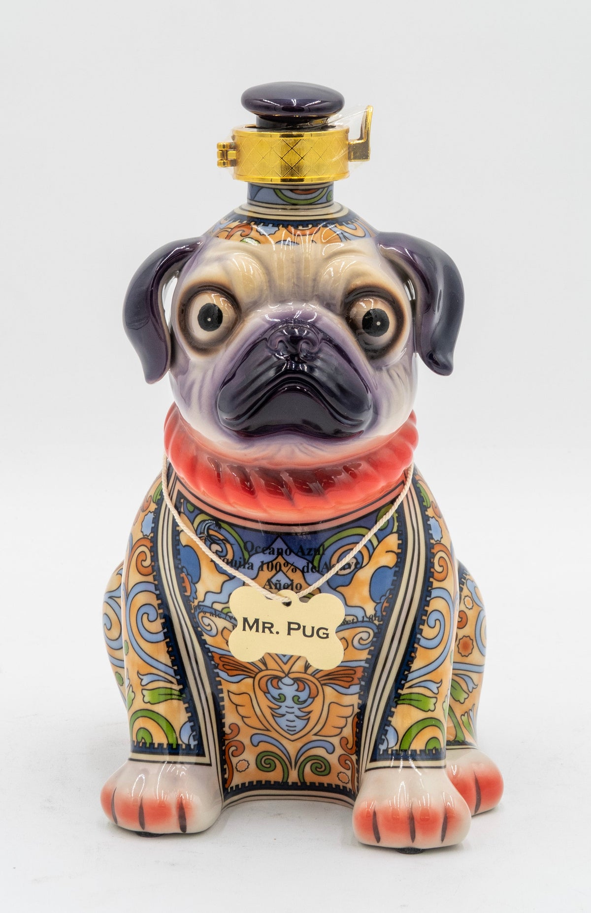 Decorative bottle shaped like a pug with colorful patterns on a white background