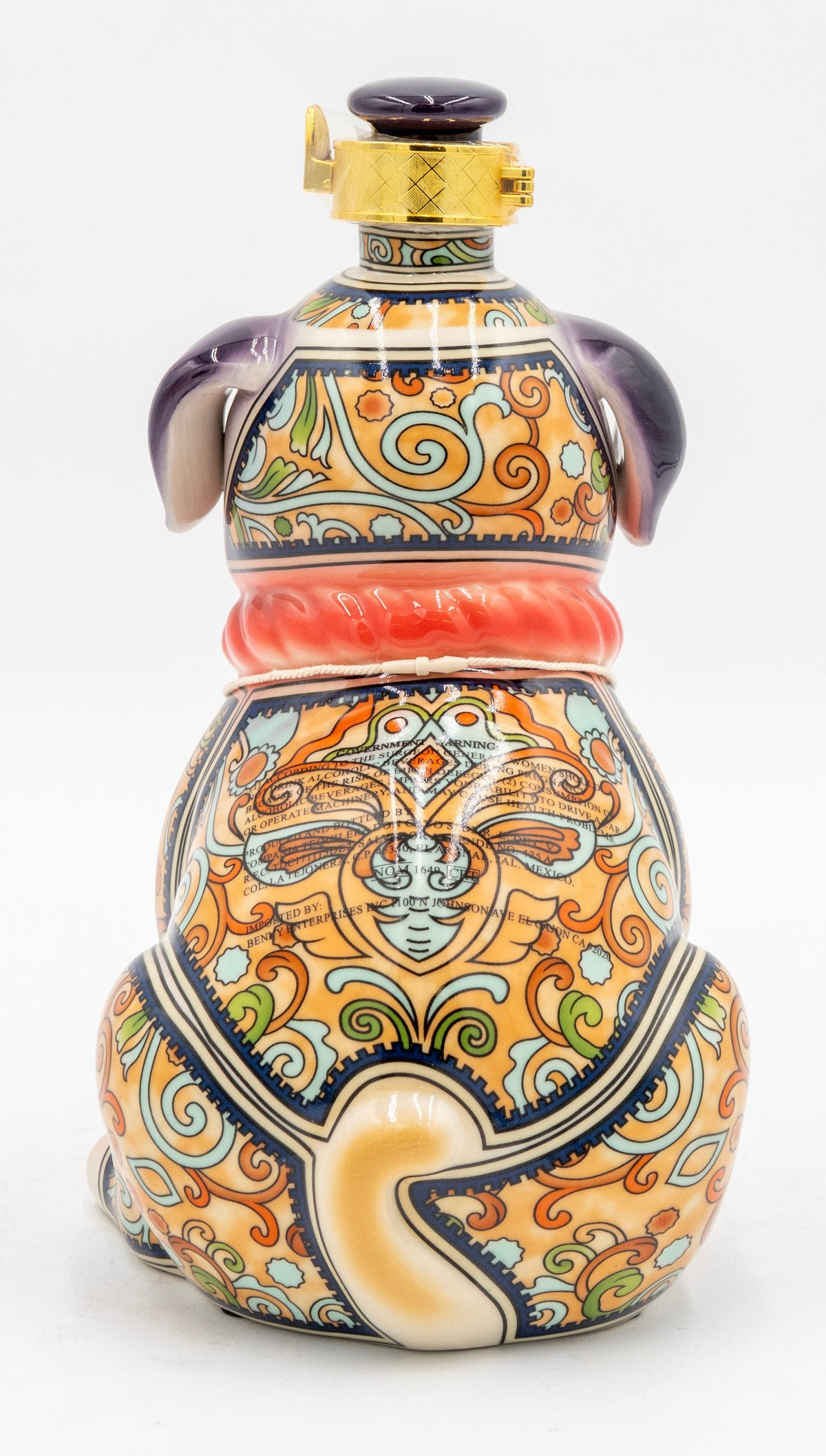 Decorative ceramic bottle with intricate patterns on a white background