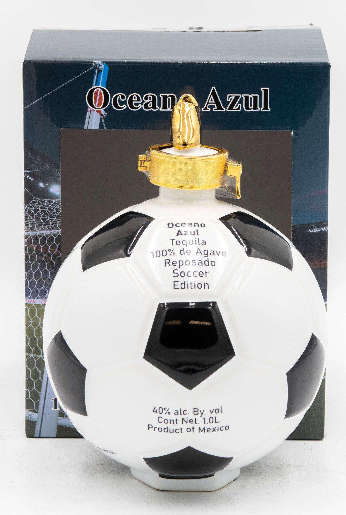 Soccer ball-shaped bottle of Oceano Azul tequila with packaging in the background