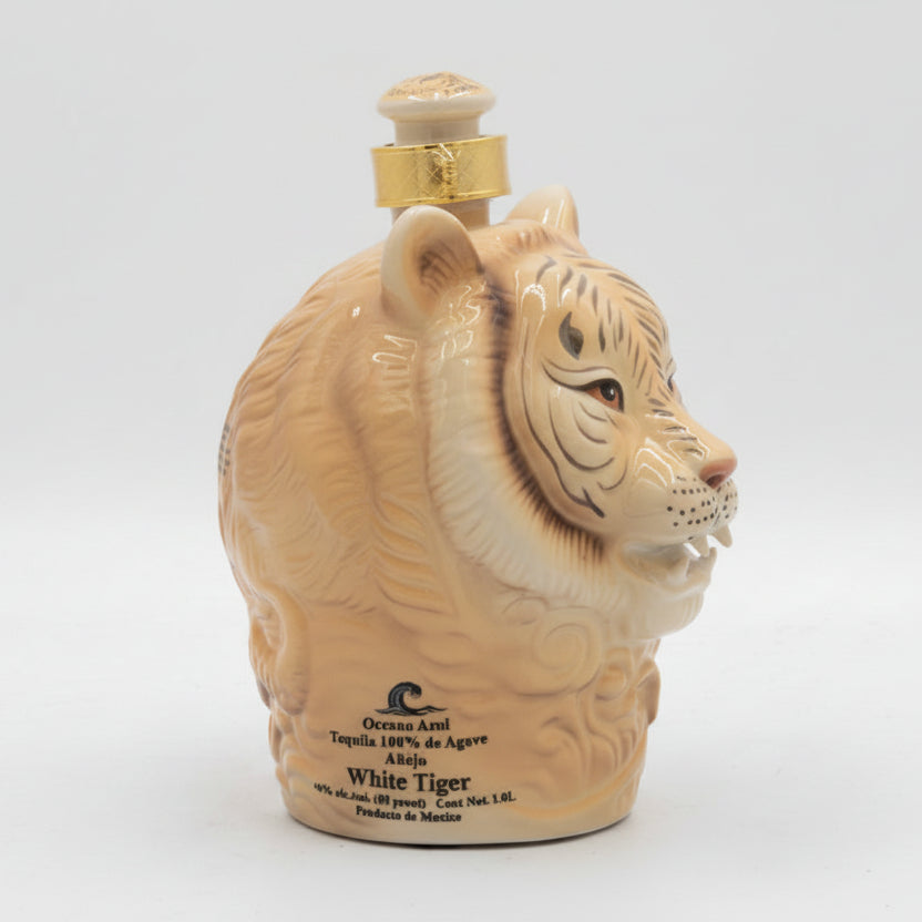 Tequila bottle shaped like a tiger head on a white background