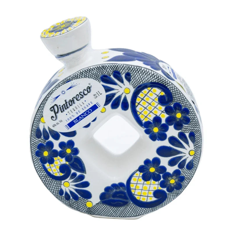 Decorative bottle with blue floral patterns on a white background