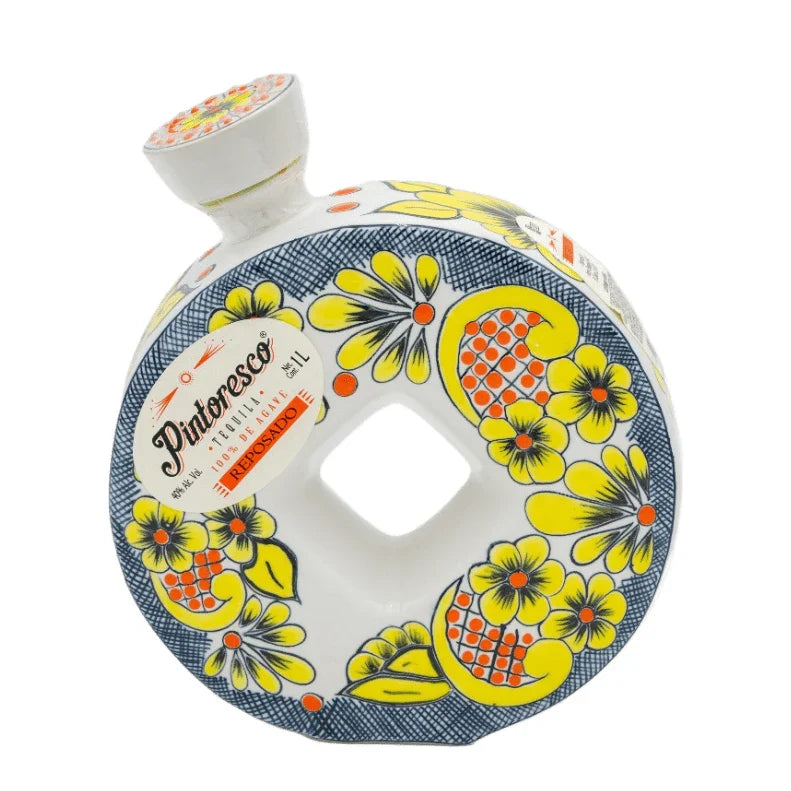Decorative bottle with floral pattern on a white background