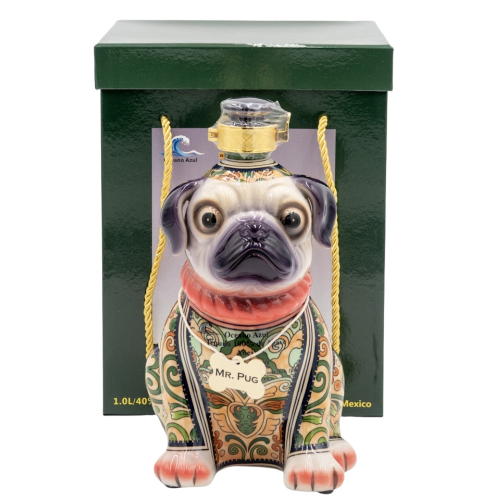 Decorative bottle shaped like a pug with a green box in the background