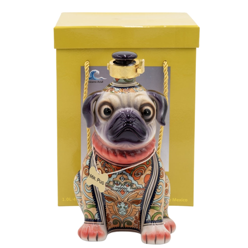 A sculptural bottle of Oceano Azul Pug Añejo Tequila, designed like a sitting dog.