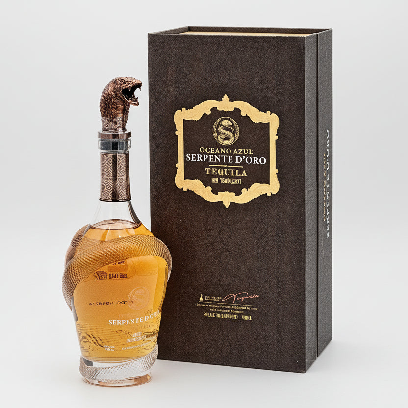 A bottle of Oceano Azul Serpente D'oro Añejo Tequila with a distinctive golden snake cap on the top, alongside its brown packaging box, displaying luxurious branding and design.