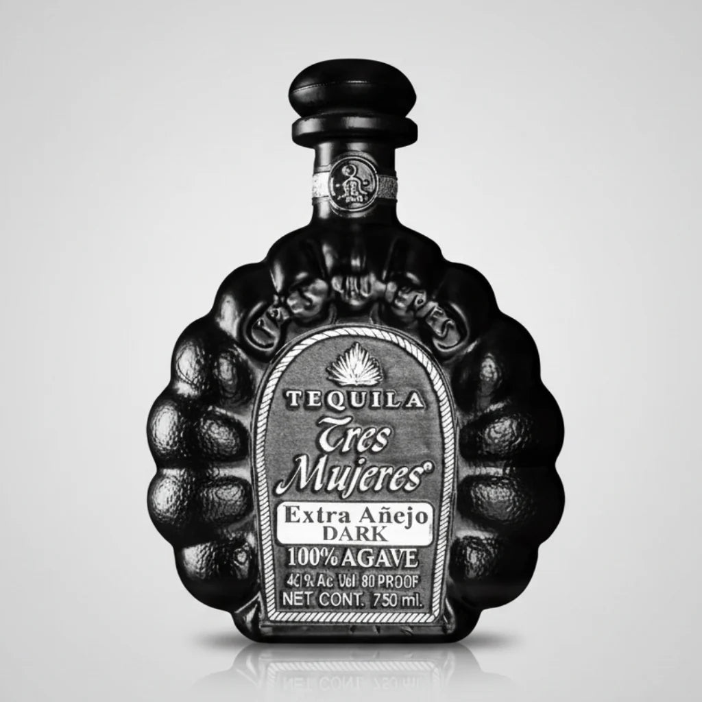 Tequila bottle labeled 'Tres Mujeres' on a white background
